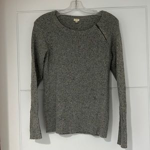 Grey sweater.